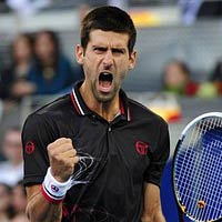 Thể thao - Thắng nhọc, Djokovic đổ lỗi cho mặt sân