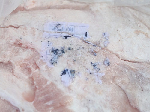 Bắt giữ xe tải chở gần 14 tấn thịt thối - 5