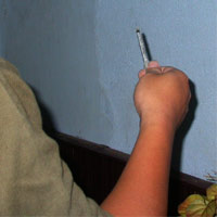 Pháp luật - Dùng kim tiêm nhiễm HIV cướp tài sản