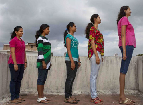 Gia đình 4 người cao gần 8 mét - 2