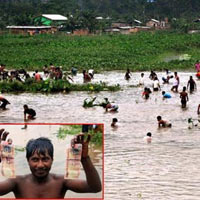 Tin tức trong ngày - Ấn Độ: "Mưa" tiền bất ngờ trút xuống đầm lầy