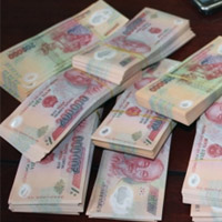 Pháp luật - Mang 124 triệu tiền giả ra chợ... lưu hành