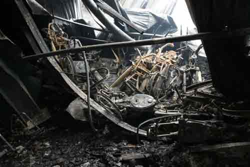 Đền bù hơn 1.000 xe máy bị cháy của công nhân - 1
