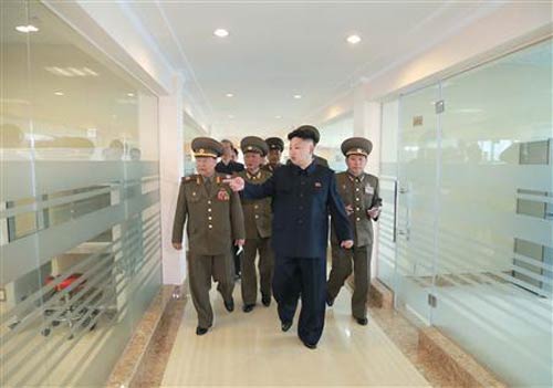 Triều Tiên dỡ bỏ cảnh báo chiến đấu cao nhất - 1