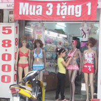 Thị trường - Tiêu dùng - Nhận phiếu giảm giá, rước “cục nợ”