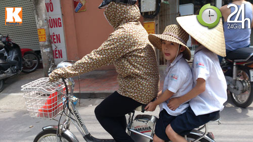 Chùm ảnh: Vật vã trong nắng gắt đầu mùa - 10