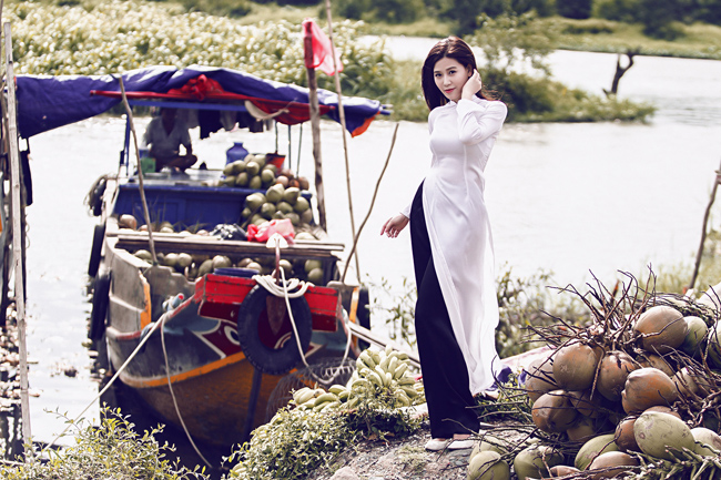  Mi Trần, cô cháy gái của Nghệ sỹ Saxophone dịu dàng trong tà áo dài trắng