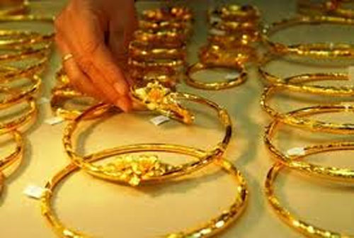 Giá vàng vọt lên 35,60 triệu, USD biến động - 1