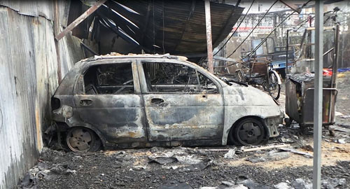 Cháy 300 xe máy: Nghi án do đốt rác cháy lan - 2