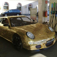 Ô tô - Xe máy - Porsche 911 Gold "nhái" giá 380 triệu đồng