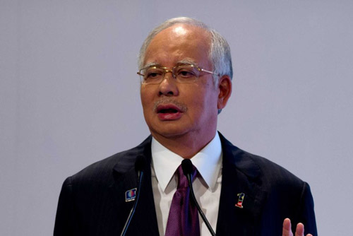 Malaysia trì hoãn công bố báo cáo về MH370 - 1