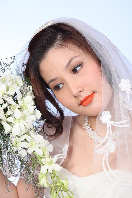 Các cô dâu xinh đẹp chưa chồng của màn ảnh Việt - 12