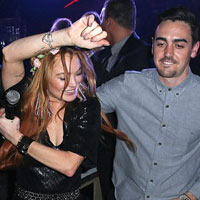 Lindsay Lohan dẫn em trai ăn chơi ở Cannes