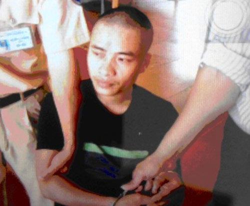 Nghi phạm sát hại vợ chồng chủ tiệm cầm đồ đã bị bắt - 1