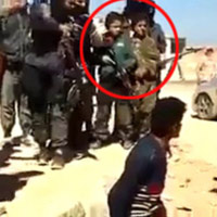 Tin tức trong ngày - Iraq: Phiến quân ép trẻ em cầm súng, xem hành hình