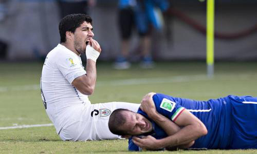 Suarez bị phạt nặng, Uruguay dọa tẩy chay World Cup - 1