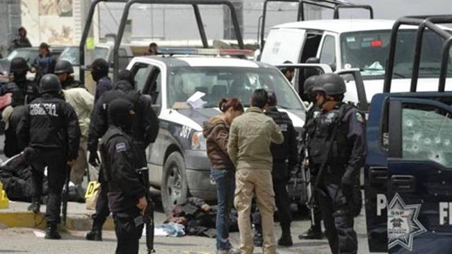Đấu súng với băng đảng, cảnh sát Mexico thiệt hại nặng - 1