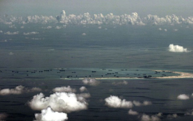 Trung Quốc lo ngại Mỹ  đưa máy bay, tàu chiến tới Biển Đông - 1