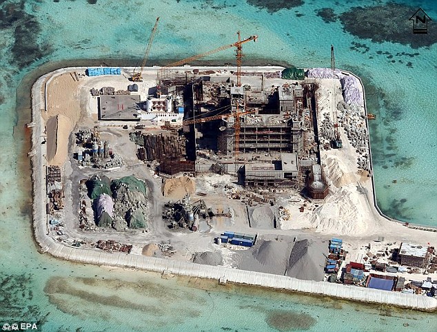 Báo Úc: TQ đã chuyển vũ khí lên đảo nhân tạo phi pháp - 1