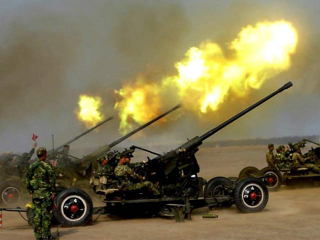 Báo Úc: TQ đã chuyển vũ khí lên đảo nhân tạo phi pháp - 2