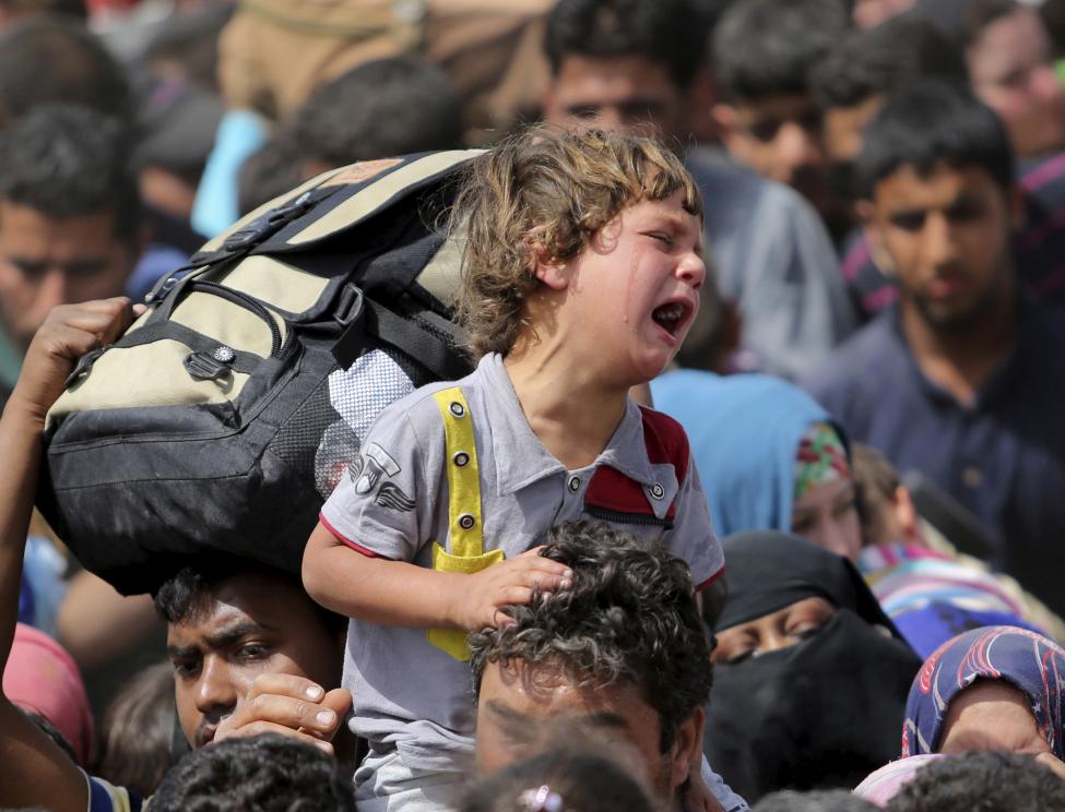 “Cơn lốc IS“: Một năm gieo rắc chết chóc và hủy diệt - 3