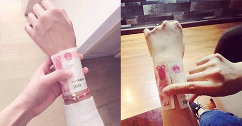 Thiếu nữ TQ "phát sốt" với trào lưu cuộn tiền cổ tay - 2
