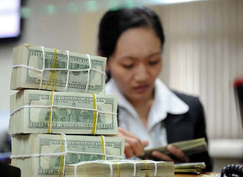 Người Việt gửi bao nhiêu tiền ở nước ngoài? - 1
