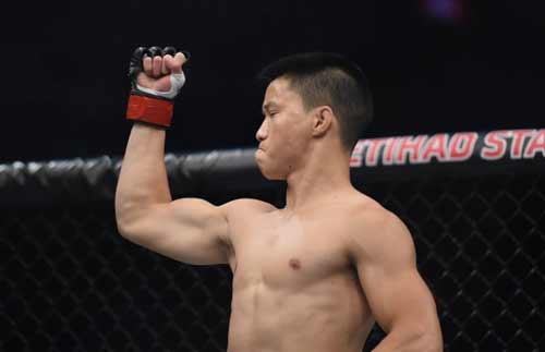 Tay đấm gốc Việt vươn lên top 15 UFC - 1