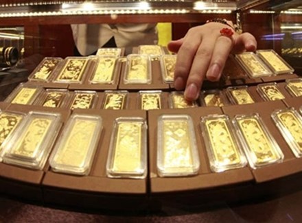 Vàng "mất" hơn 300 nghìn đồng - 1