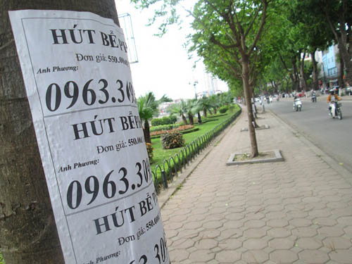 Hình ảnh luộm thuộm của "ma trận" quảng cáo ở Hà Nội - 13