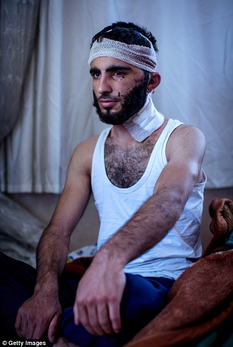 Ảnh nạn nhân của IS chụp sau khi bị tra tấn, &#34;dính&#34; đạn - 1