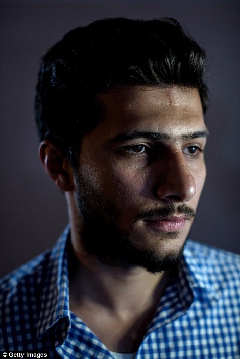 Ảnh nạn nhân của IS chụp sau khi bị tra tấn, "dính" đạn - 5