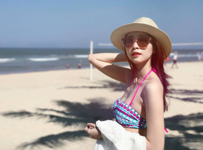 Hoa hậu Thu Thảo tung ảnh áo tắm hiếm hoi kỳ nghỉ lễ - 1
