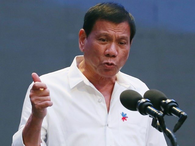 Duterte phản ứng quyết liệt sau vụ IS chặt đầu cảnh sát - 1