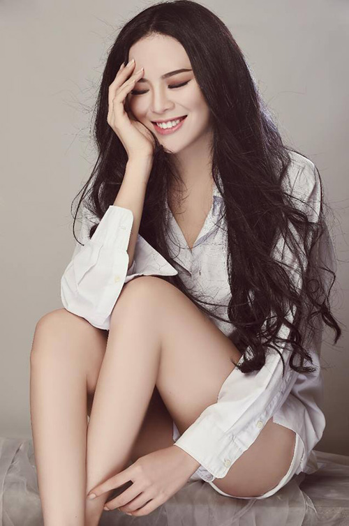 Vẻ sexy của người đẹp Đà Nẵng vừa có đám cưới 10 tỷ với đại gia “mía đường” - 4