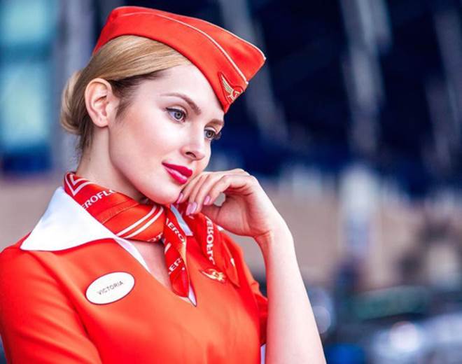 Tiếp viên hàng không Nga đã đẹp như hoa hậu còn quá dẻo - 1