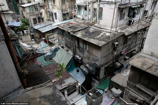 20 vạn dân Hong Kong đang nhồi nhét trong “nhà quan tài” - 2