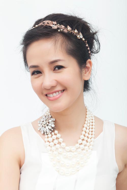 Hồng Nhung tươi trẻ đến bất ngờ - 4