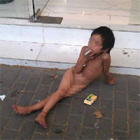 Tin tức trong ngày - TQ: Bố bắt con gái 6 tuổi trần truồng ăn xin