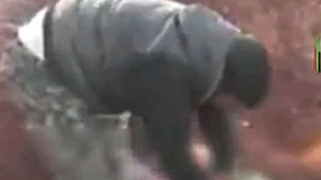 Đằng sau clip "ăn tim" gây rúng động ở Syria - 3