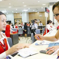 Kinh doanh - Ngân hàng đồng loạt hạ lãi suất