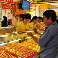 Tài chính - Bất động sản - Vàng ngoại giảm mạnh, vàng nội trầm lắng