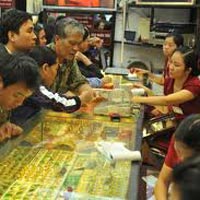 Tài chính - Bất động sản - Vàng đảo chiều đi xuống sau khi tăng vọt