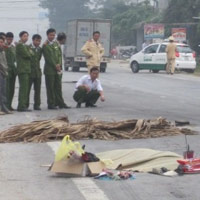 Pháp luật - HN: Xác một phụ nữ bị giết nằm bên đường
