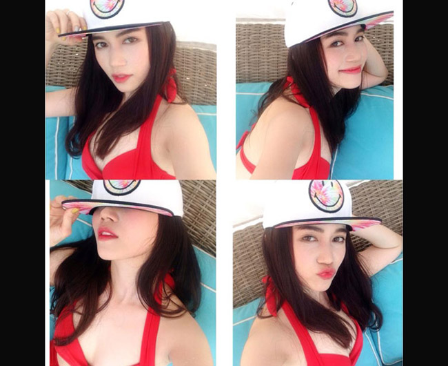 VJ Sĩ Thanh sexy khoe làn da trắng trong bộ bikini đỏ nổi bật. Đây là thời điểm cô đi du lịch tại Singapore cùng ê kíp làm phim Căn hộ số 69.
