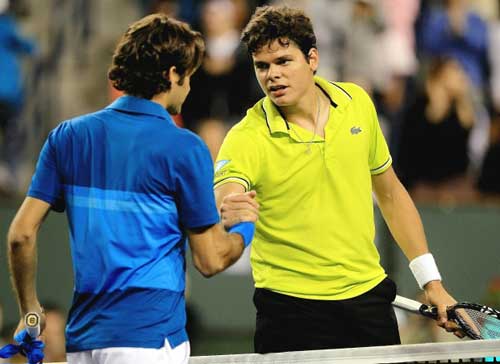 Federer e ngại những pha giao bóng sấm sét của Raonic - 1