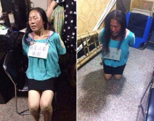 TQ: Một phụ nữ bị trói, sỉ nhục vì trộm quần áo - 1