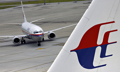 Máy bay Malaysia Airlines lại suýt gặp thảm họa - 1