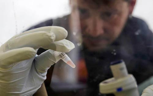 Hình ảnh đau lòng về dịch Ebola tuần qua - 12