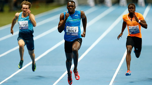 Usain Bolt lập kỷ lục mới chạy 100m - 1